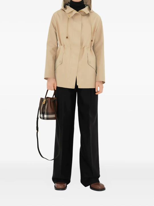 Brown bag worn by a person, showing the bag's fit