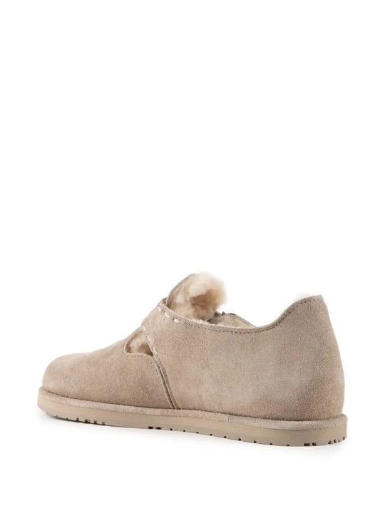Tan shoes, side view
