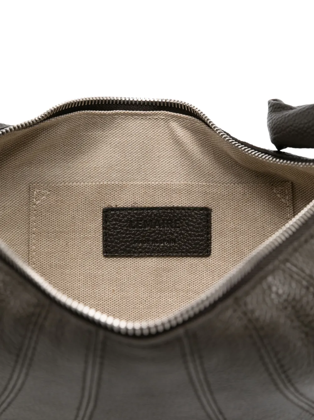Close up of the black bag, showing texture of the leather fabric