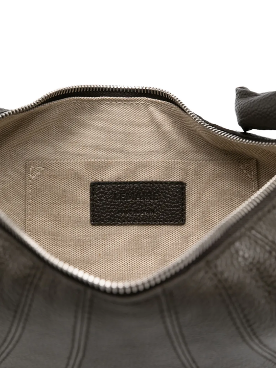Close up of the black bag, showing texture of the leather fabric