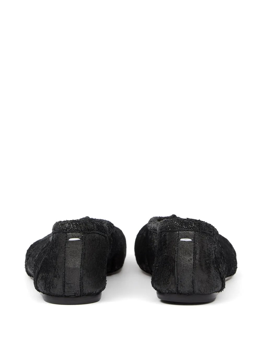 Black flat, back view