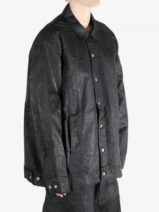 Black jackets-coats worn by a person, showing the fit