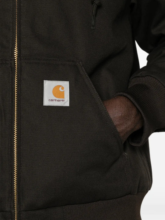 Close up of Black jacket, showing texture of the 100% canvas fabric