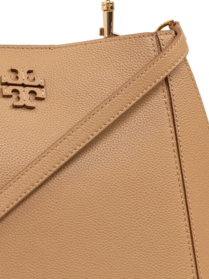 Close up of tan bag, showing texture of the leather fabric