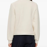 White knitwear, full body view