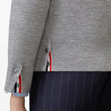 Close up of Grey knitwear, showing texture of the 84% virgin wool/ 11% linen/ 5% cotton made in fabric