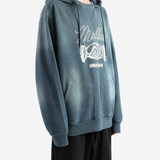 Navy hoodie worn by a person, showing the hoodie fit