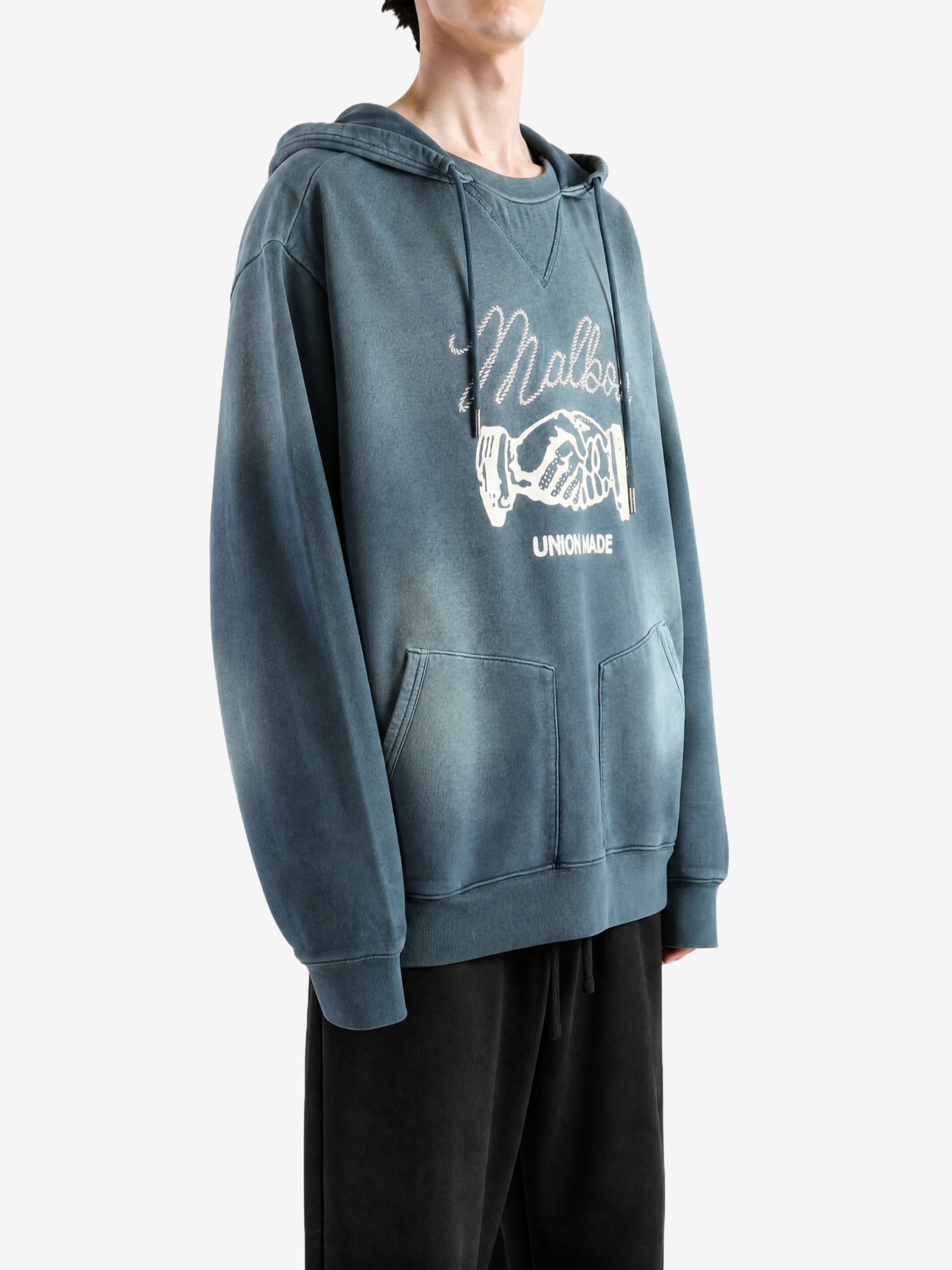 Navy hoodie worn by a person, showing the hoodie fit