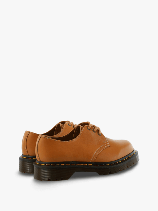 Tan shoes, side view