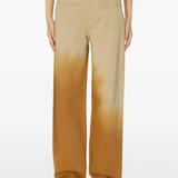 Brown pants worn by a person, showing the pants fit