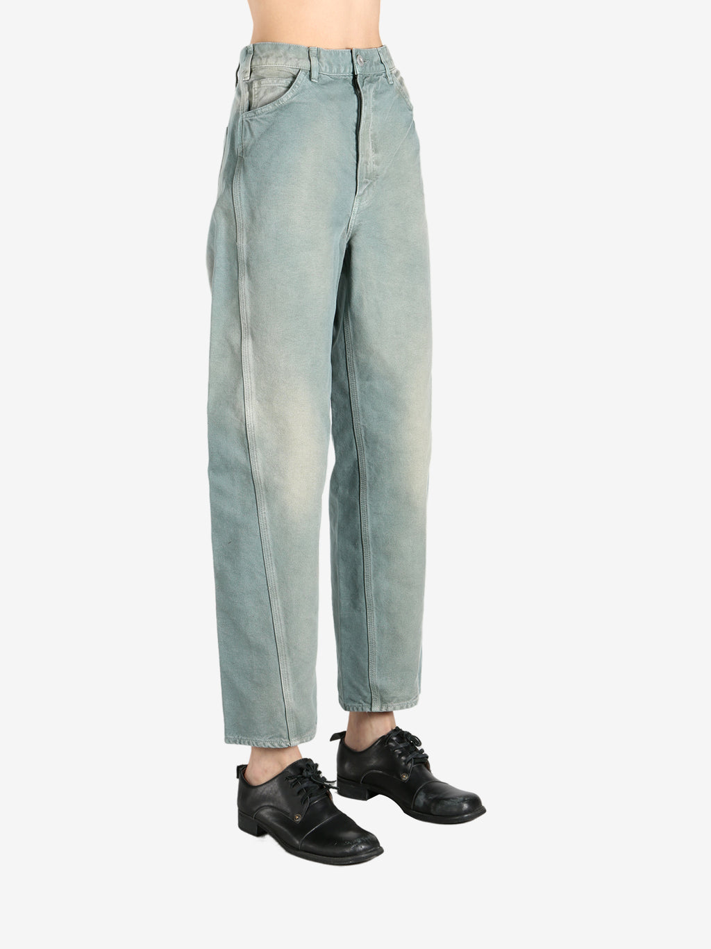 Green pant worn by a person, showing the pant's fit