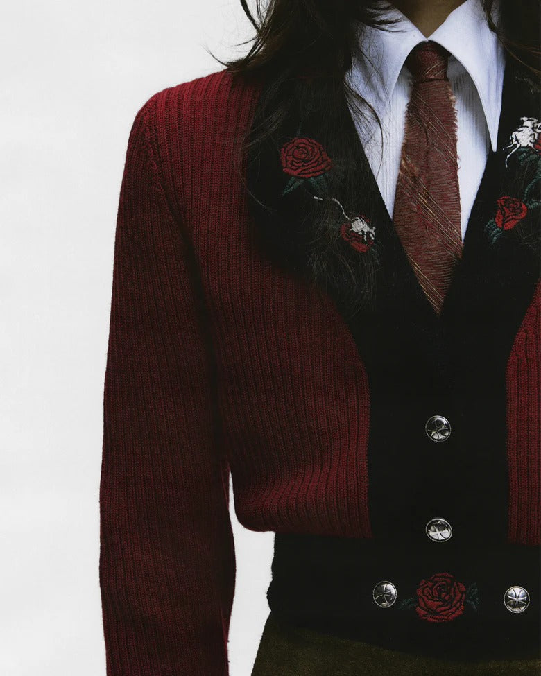 Close up of Red knitwear, showing texture of the wool fabric