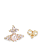 Close up of the white jewerly, showing texture of the faux pearl