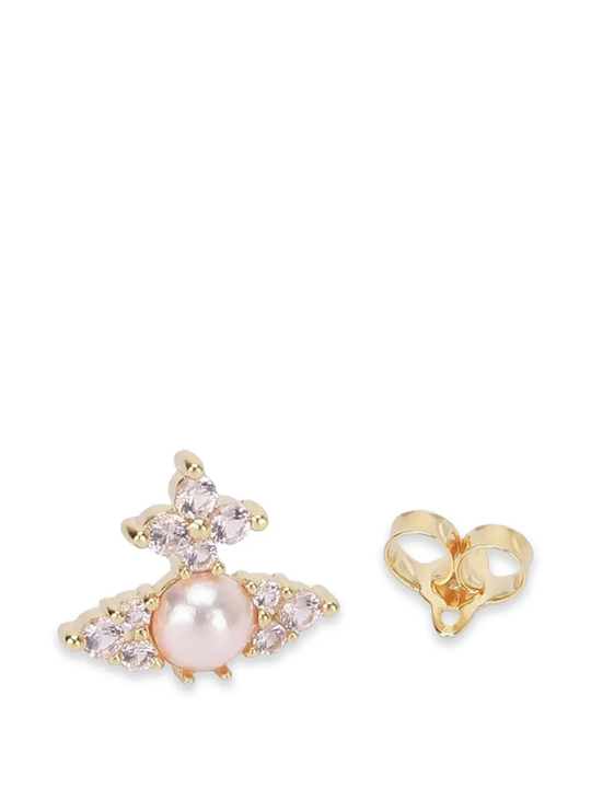 Close up of the white jewerly, showing texture of the faux pearl