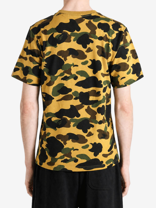 Yellow t-shirt worn by a person, showing the t-shirt fit