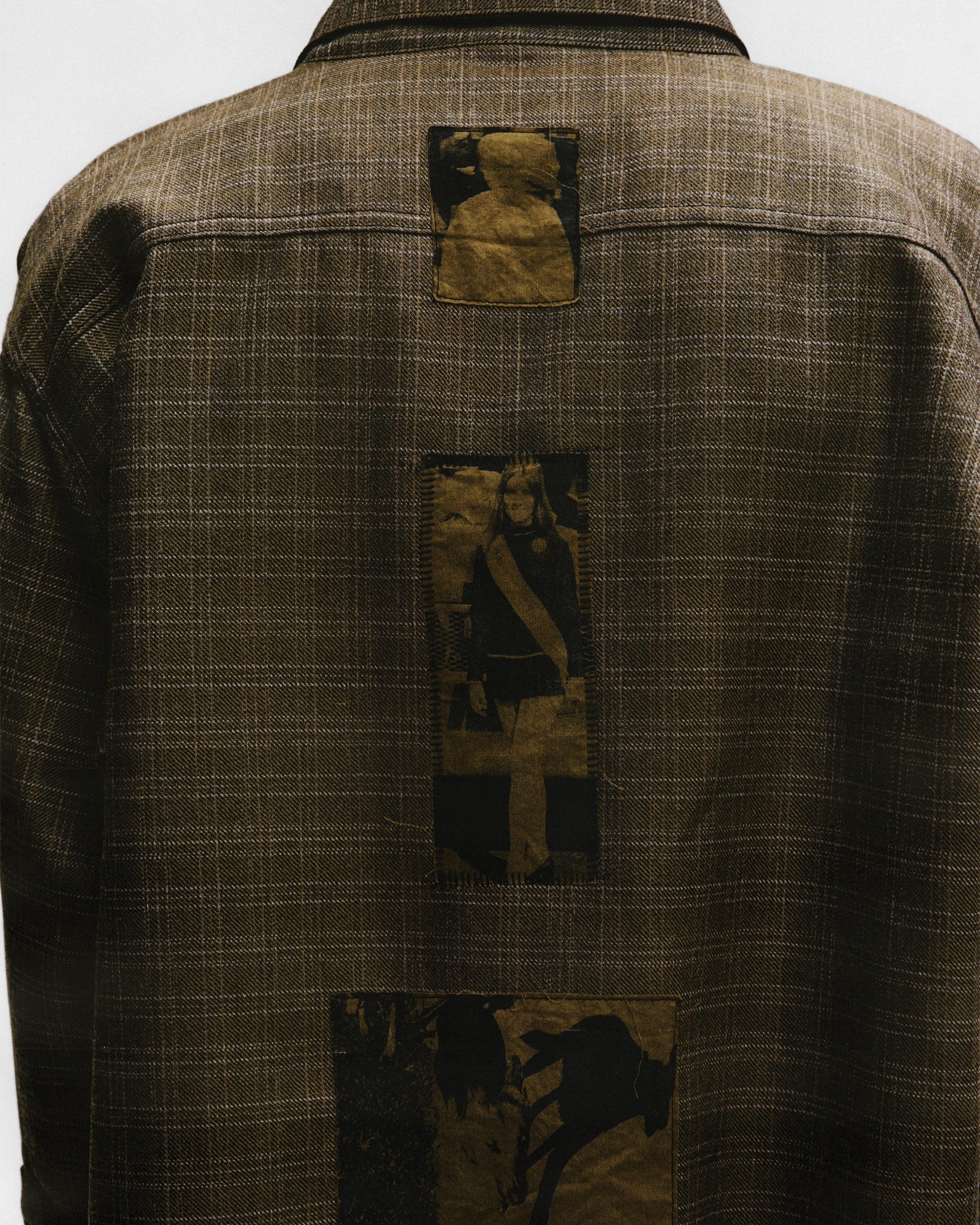 Brown shirts worn by a person, showing the shirts fit