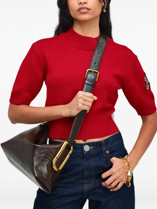 Brown bag worn by a person, showing the bag fit