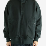 Grey jacket worn by a person, showing the jacket's fit