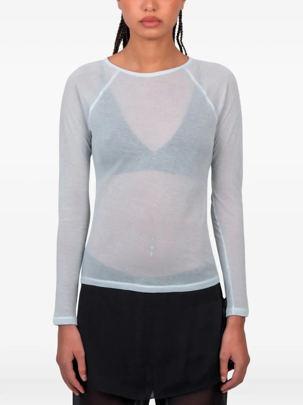 Blue t-shirt worn by a person, showing the t-shirt fit