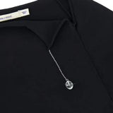 Close up of the black top, showing texture of the cotton fabric