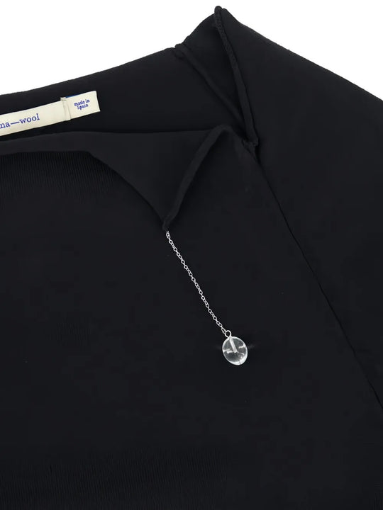 Close up of the black top, showing texture of the cotton fabric