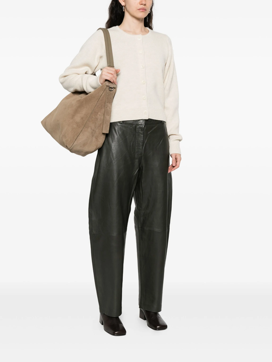 grey bag worn by a person, showing the bag's fit