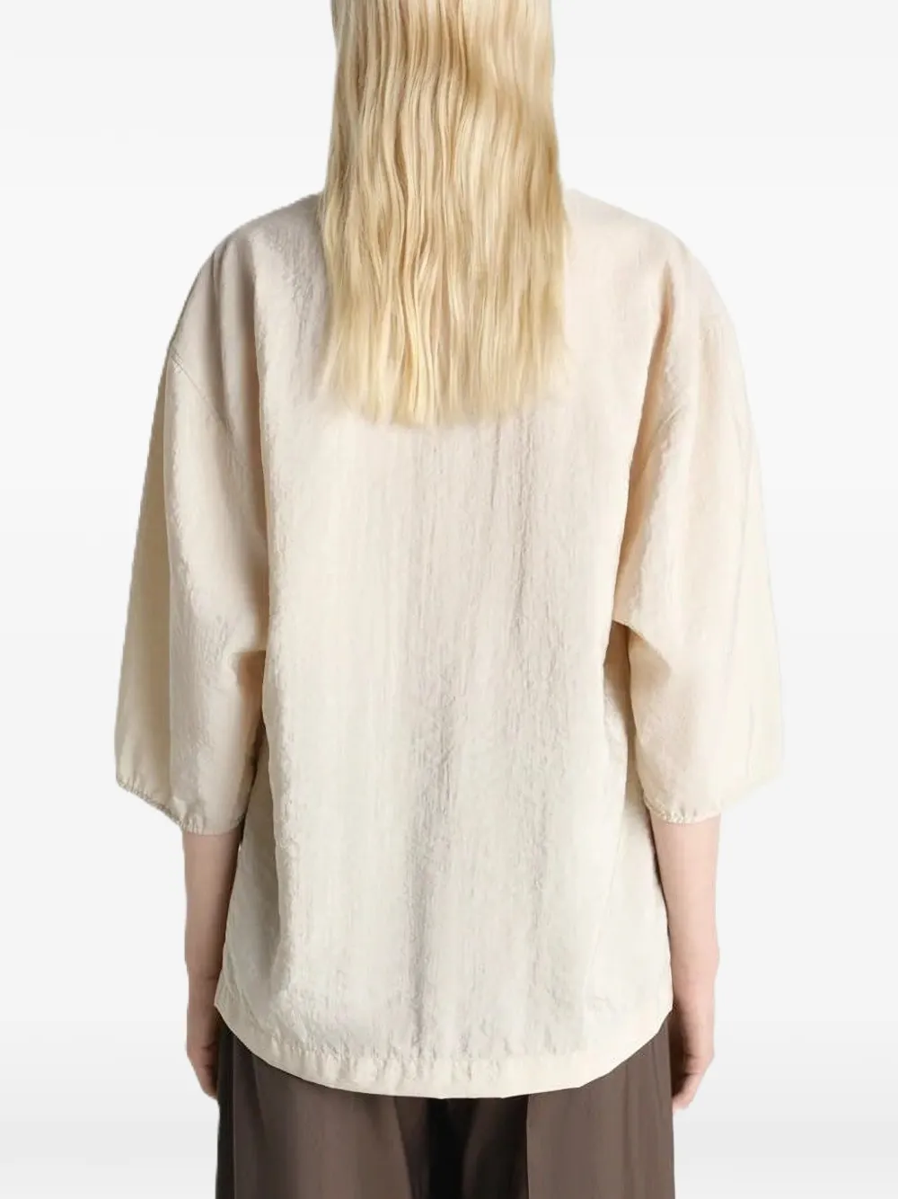 Close up of tan top, showing texture of the Silk and Polyamide fabric