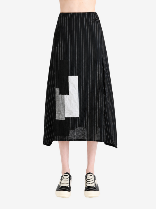 Black skirt worn by a person, showing the skirt fit