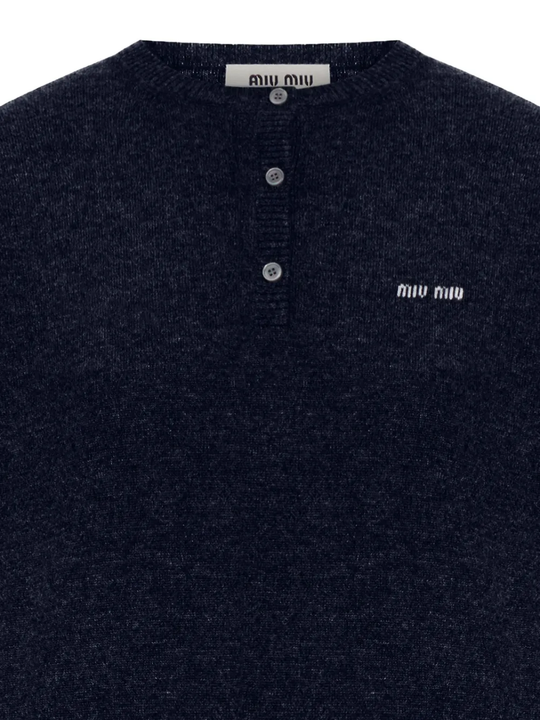 Close up of blue knitwear, showing texture of the Cashmere fabric