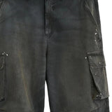 Close up of grey pants, showing texture of the cotton fabric