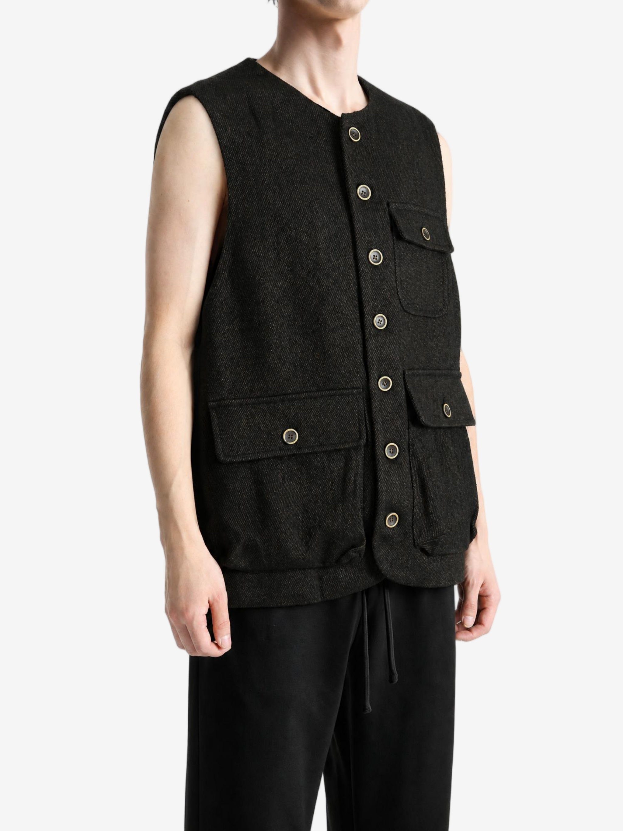 Black jacket worn by a person, showing the jacket fit