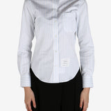 Blue shirt worn by a person, showing the shirt's fit