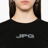 Close up of black shirt, showing texture of the cotton fabric