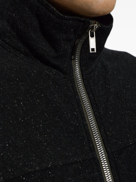 Close up of Black hoodie, showing texture of the 65% wool/ 35% cotton fabric