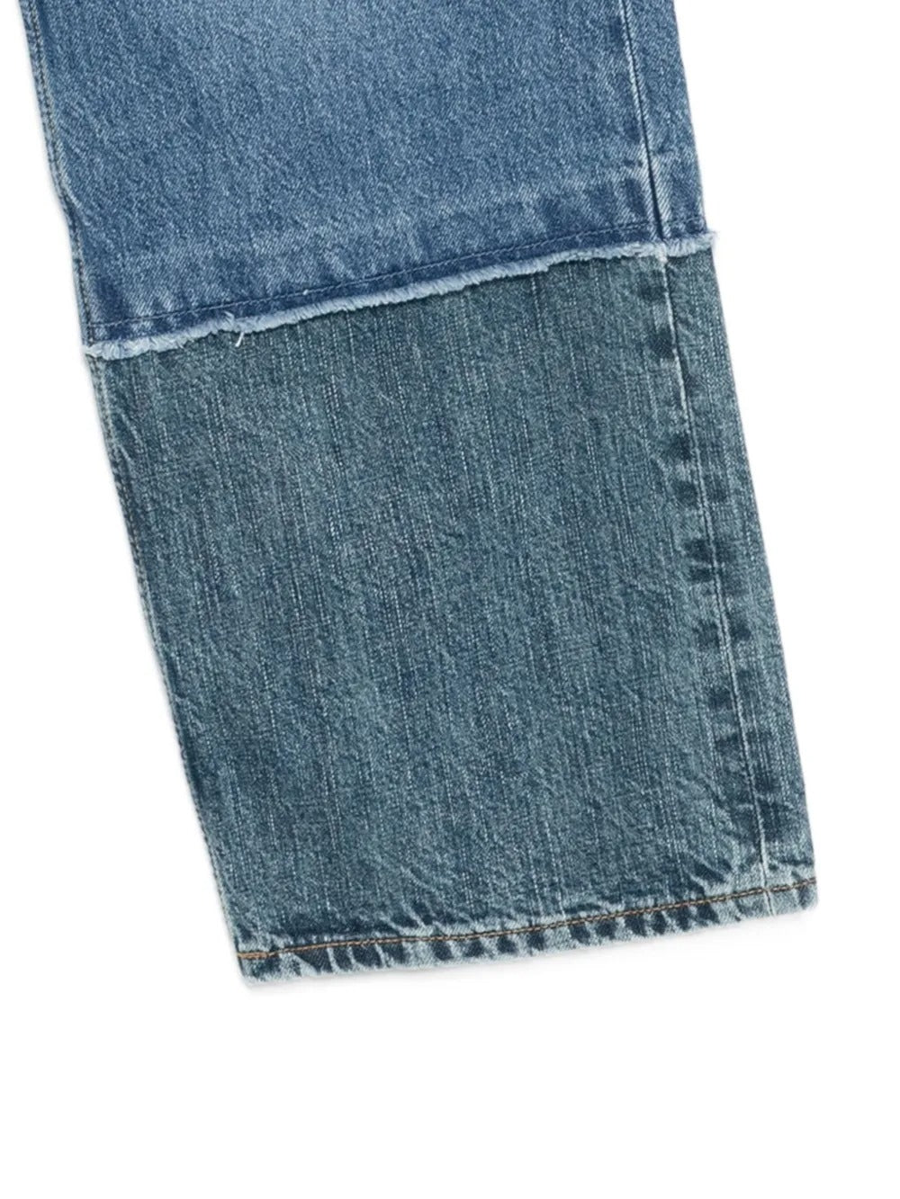 Close up of the blue jeans, showing texture of the cotton fabric