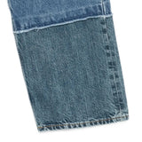 Close up of the blue jeans, showing texture of the cotton fabric