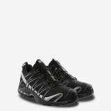 Black sneakers, side view