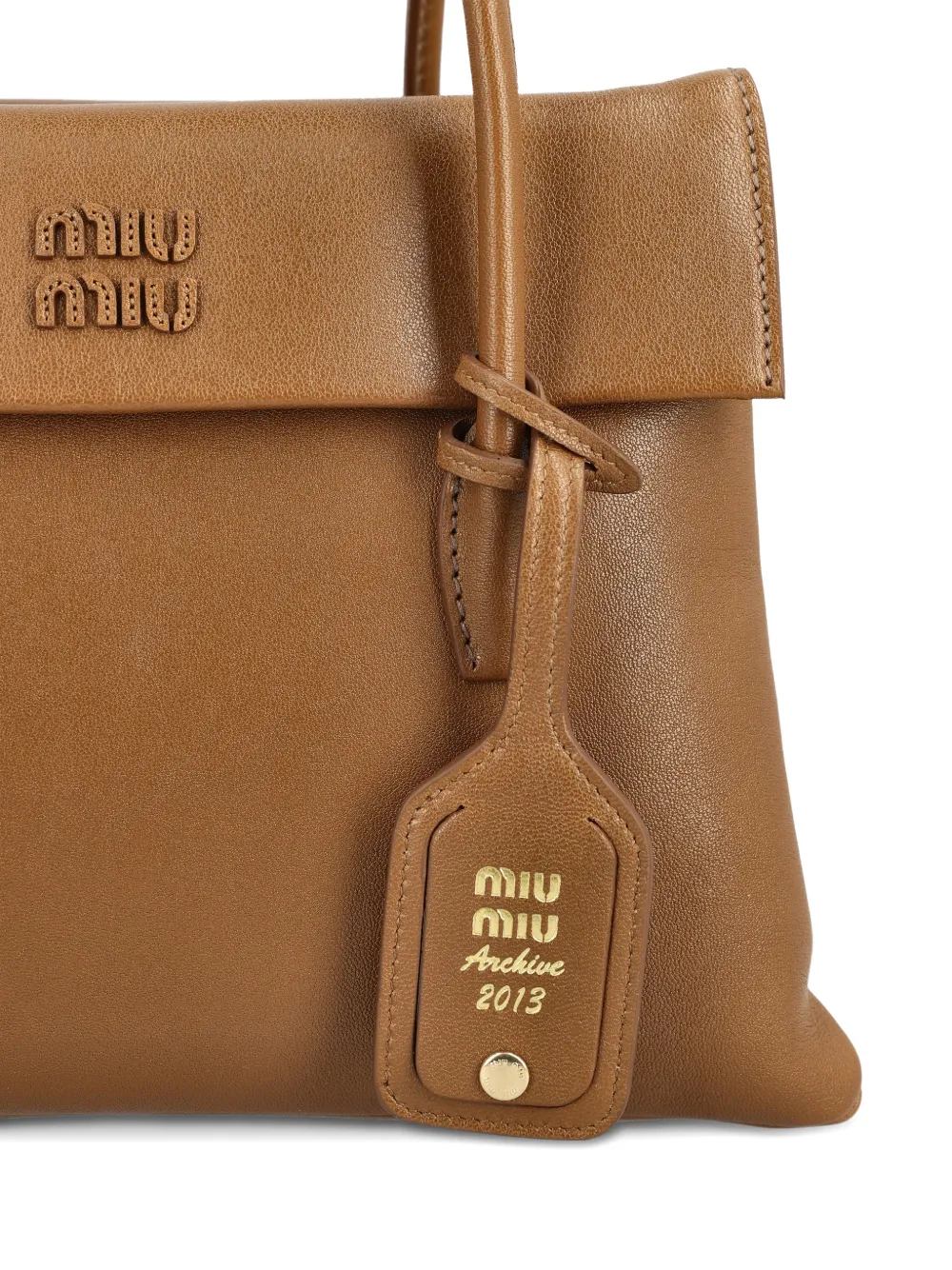 Close up of brown bag,showing texture of the lambskin fabric