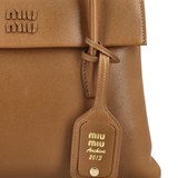 Close up of brown bag,showing texture of the lambskin fabric