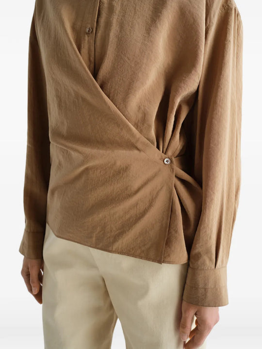 Tan dress worn by a person, showing the dress fit