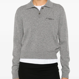 grey shirt worn by a person, showing the shirt fit