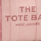 Close up of the pink bag, showing texture of the cotton fabric