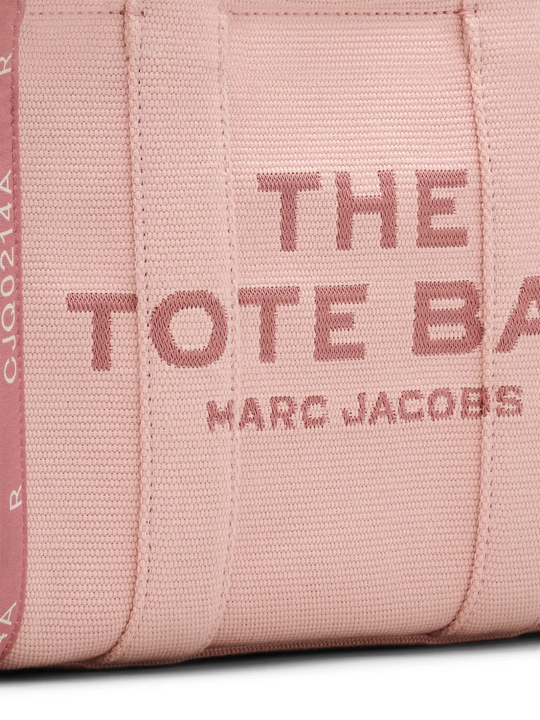 Close up of the pink bag, showing texture of the cotton fabric
