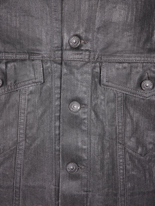 Close up of grey jackets, showing texture of the cotton fabric