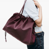 Burgundy bag, side view