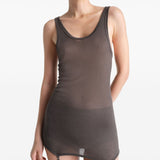 Brown top worn by a person, showing the top’s fit