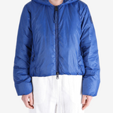 Blue jacket worn by a person, showing the jacket fit