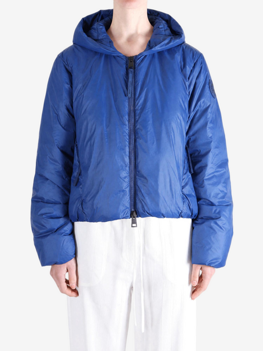 Blue jacket worn by a person, showing the jacket fit
