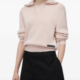 Pink knitwear, front view