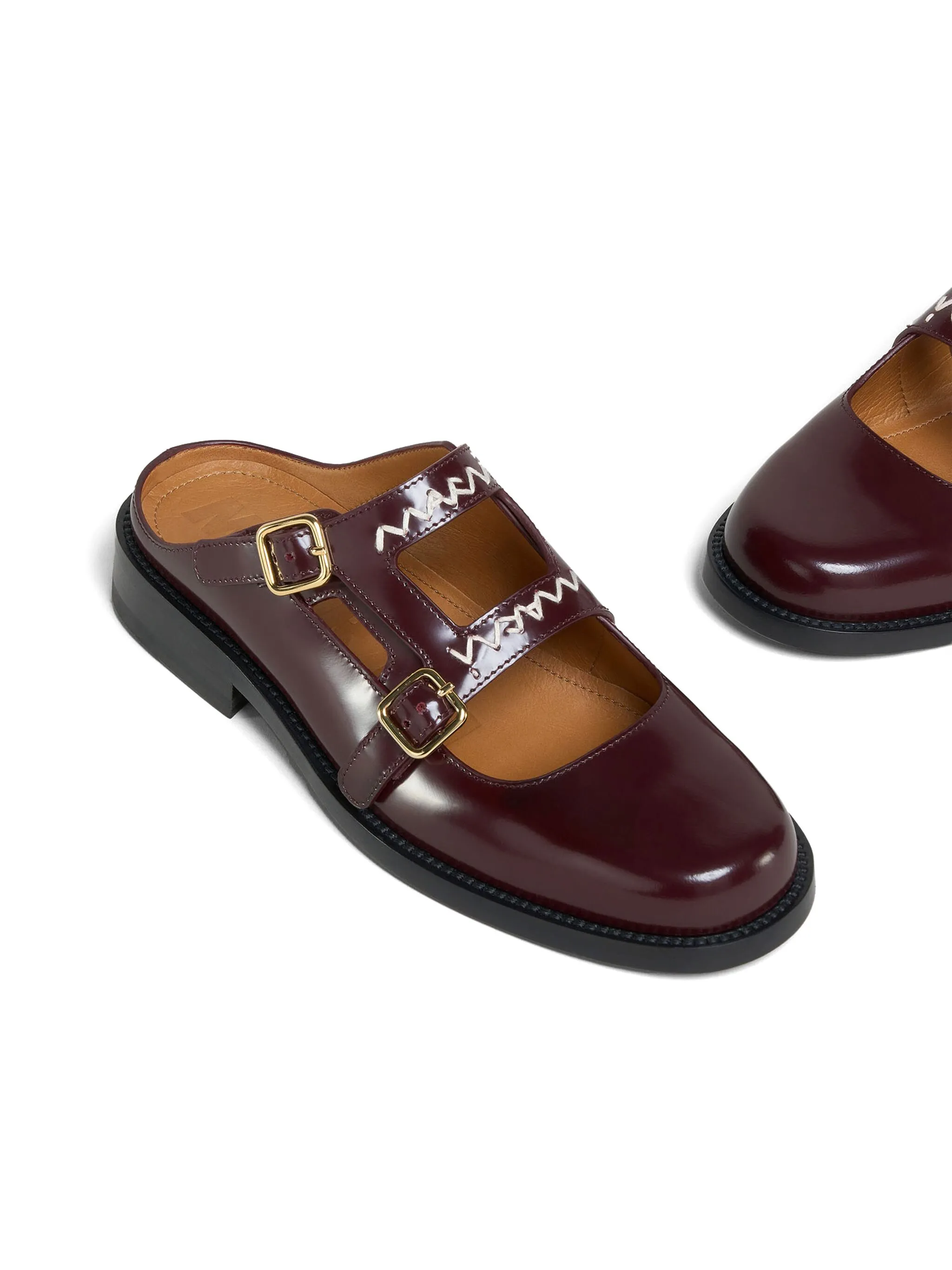 Close up of brown loafers, showing texture of the Calf Leather fabric